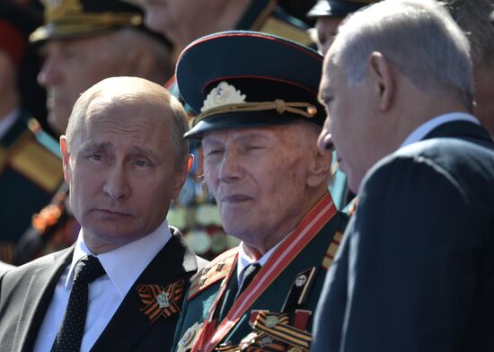 President Vladimir Putin and Prime Minister Dmitry Medvedev at military parade to mark 73rd anniversary of Victory in Great Patriotic War