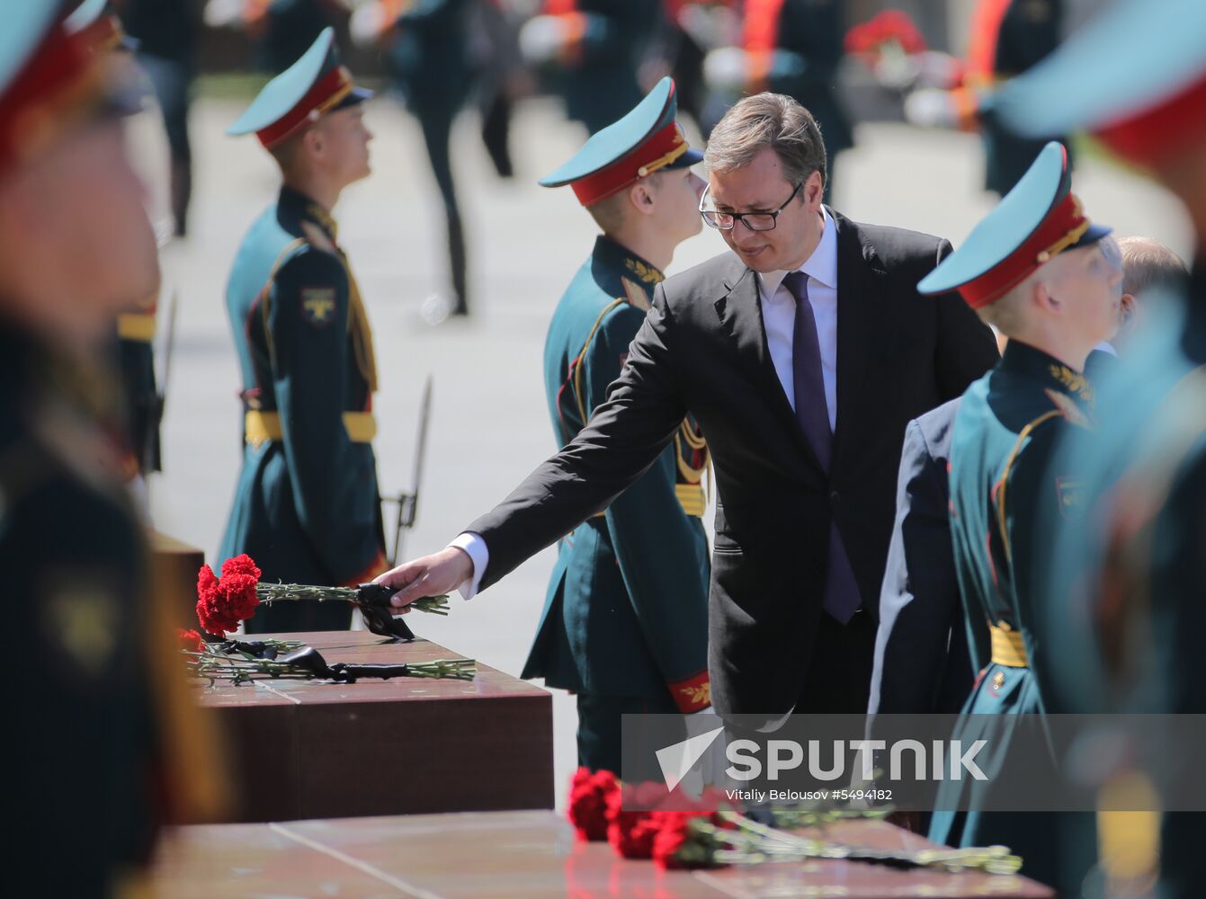 President Vladimir Putin and Prime Minister Dmitry Medvedev at wreath-laying ceremony at Unknown Soldiers' Tomb