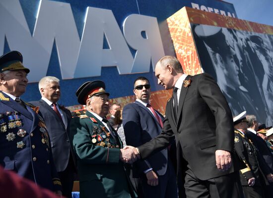 President Vladimir Putin and Prime Minister Dmitry Medvedev at military parade to mark 73rd anniversary of Victory in Great Patriotic War