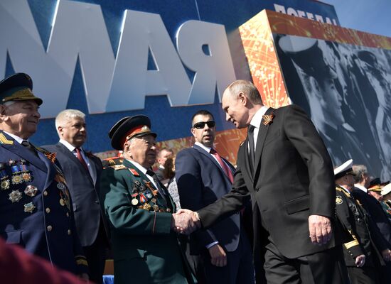 President Vladimir Putin and Prime Minister Dmitry Medvedev at military parade to mark 73rd anniversary of Victory in Great Patriotic War