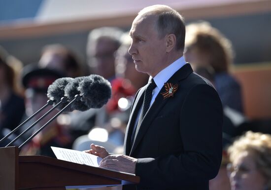 President Vladimir Putin and Prime Minister Dmitry Medvedev at military parade to mark 73rd anniversary of Victory in Great Patriotic War