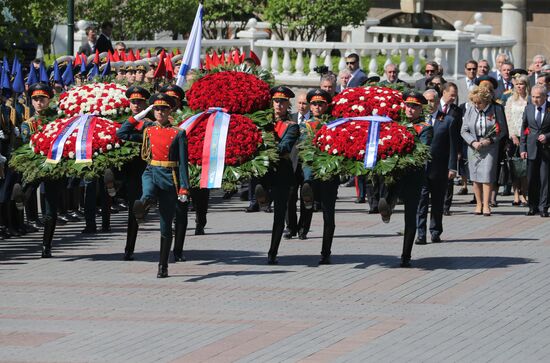 President Vladimir Putin and Prime Minister Dmitry Medvedev at wreath-laying ceremony at Unknown Soldiers' Tomb