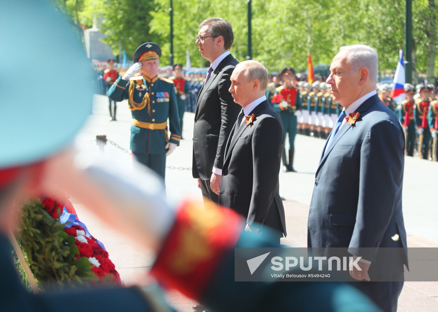 President Vladimir Putin and Prime Minister Dmitry Medvedev at wreath-laying ceremony at Unknown Soldiers' Tomb