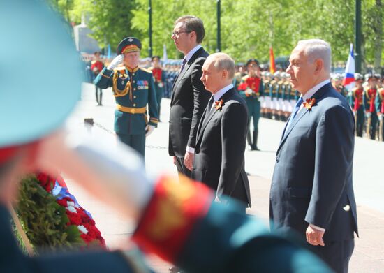 President Vladimir Putin and Prime Minister Dmitry Medvedev at wreath-laying ceremony at Unknown Soldiers' Tomb
