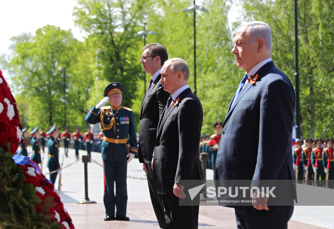 President Vladimir Putin and Prime Minister Dmitry Medvedev at wreath-laying ceremony at Unknown Soldiers' Tomb