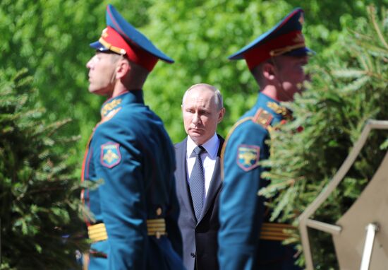 President Vladimir Putin and Prime Minister Dmitry Medvedev at wreath-laying ceremony at Unknown Soldiers' Tomb