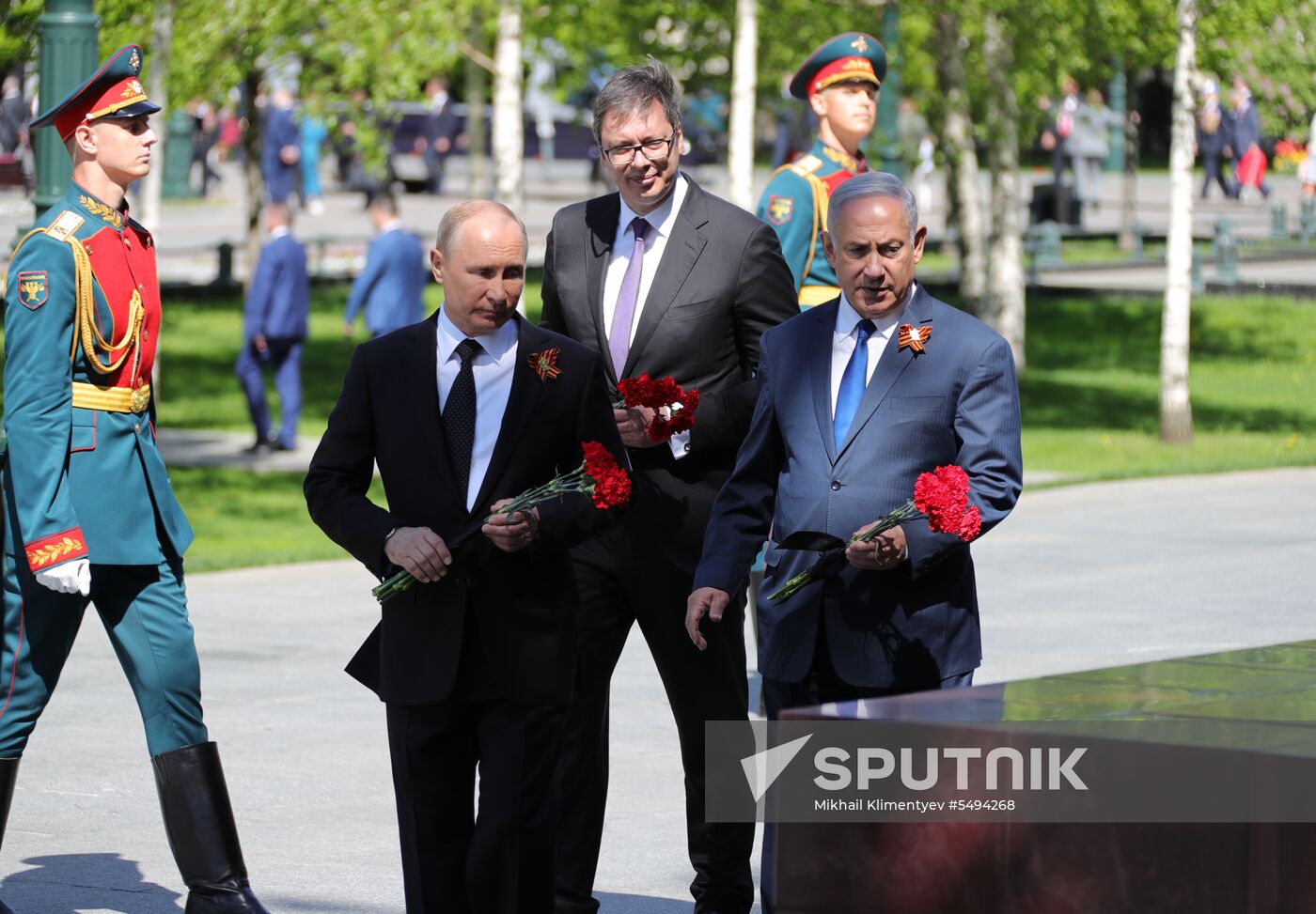 President Vladimir Putin and Prime Minister Dmitry Medvedev at wreath-laying ceremony at Unknown Soldiers' Tomb