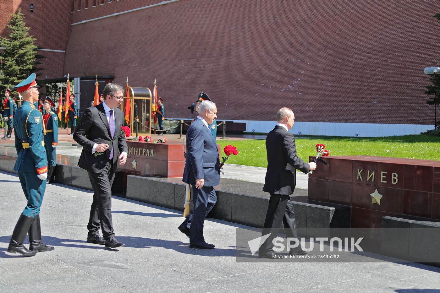 President Vladimir Putin and Prime Minister Dmitry Medvedev at wreath-laying ceremony at Unknown Soldiers' Tomb