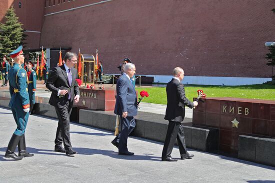 President Vladimir Putin and Prime Minister Dmitry Medvedev at wreath-laying ceremony at Unknown Soldiers' Tomb