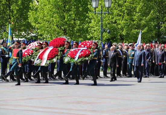 President Vladimir Putin and Prime Minister Dmitry Medvedev at wreath-laying ceremony at Unknown Soldiers' Tomb