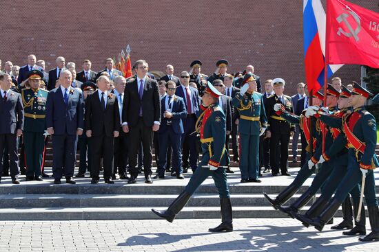 President Vladimir Putin and Prime Minister Dmitry Medvedev at wreath-laying ceremony at Unknown Soldiers' Tomb