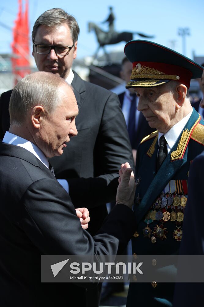 President Vladimir Putin and Prime Minister Dmitry Medvedev at military parade to mark 73rd anniversary of Victory in Great Patriotic War