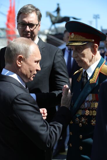 President Vladimir Putin and Prime Minister Dmitry Medvedev at military parade to mark 73rd anniversary of Victory in Great Patriotic War