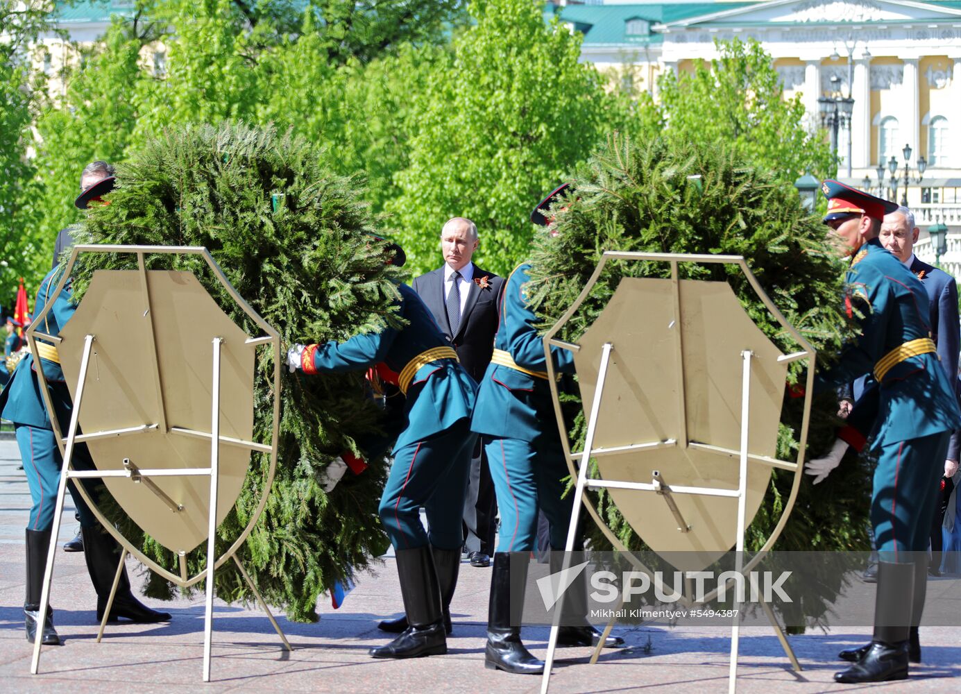 President Vladimir Putin and Prime Minister Dmitry Medvedev at wreath-laying ceremony at Unknown Soldiers' Tomb