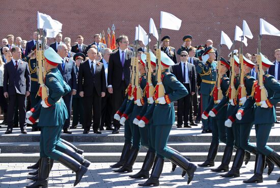 President Vladimir Putin and Prime Minister Dmitry Medvedev at wreath-laying ceremony at Unknown Soldiers' Tomb