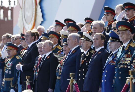 President Vladimir Putin and Prime Minister Dmitry Medvedev at military parade to mark 73rd anniversary of Victory in Great Patriotic War