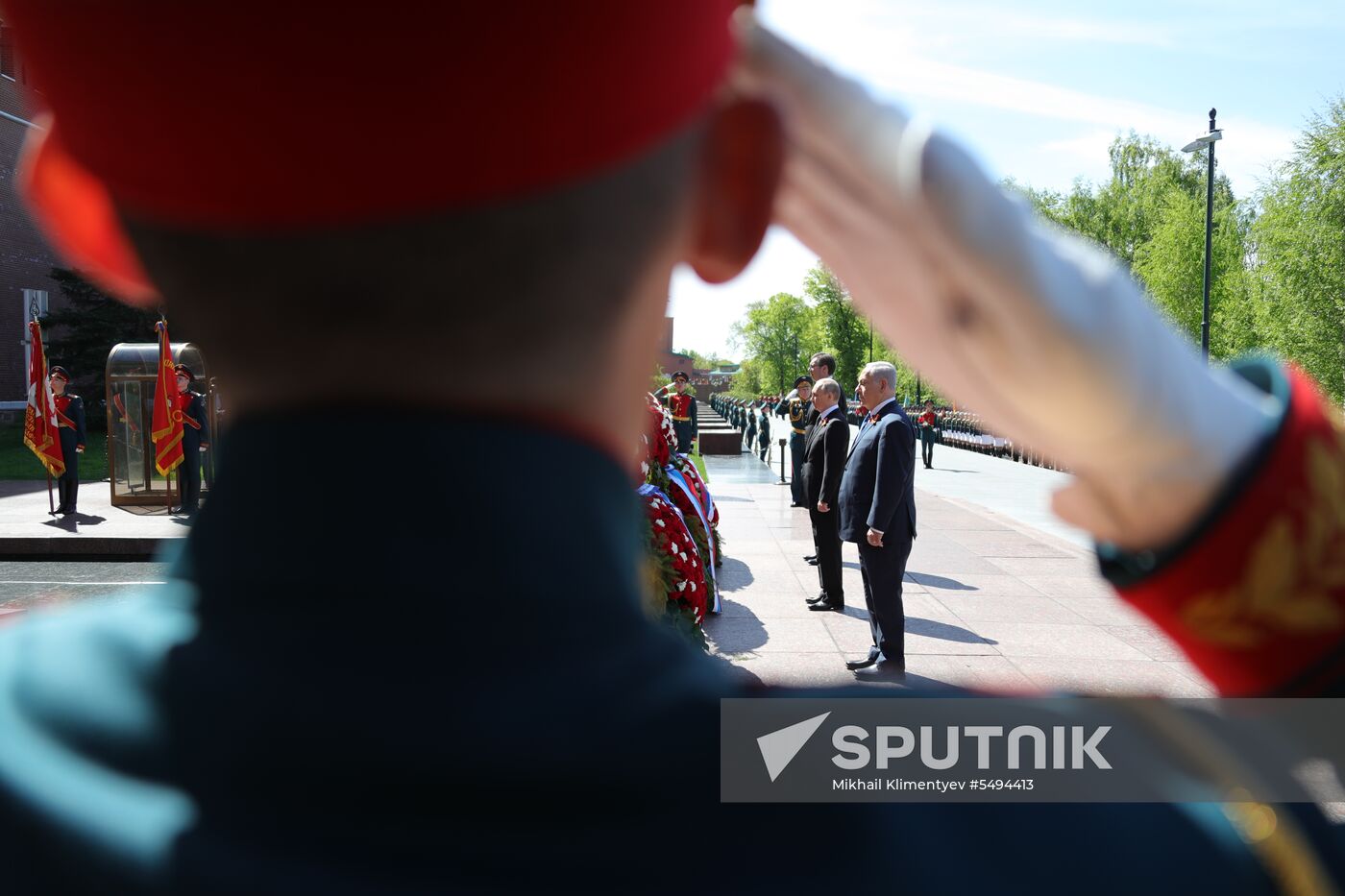 President Vladimir Putin and Prime Minister Dmitry Medvedev at wreath-laying ceremony at Unknown Soldiers' Tomb