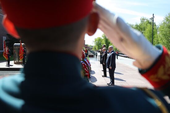 President Vladimir Putin and Prime Minister Dmitry Medvedev at wreath-laying ceremony at Unknown Soldiers' Tomb