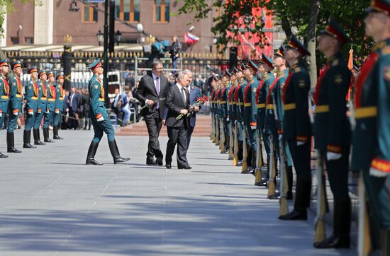 President Vladimir Putin and Prime Minister Dmitry Medvedev at wreath-laying ceremony at Unknown Soldiers' Tomb