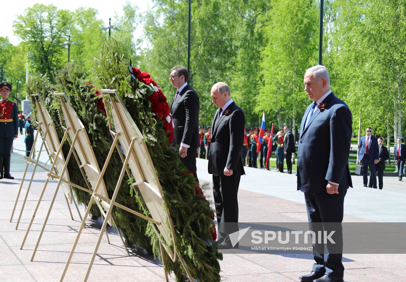 President Vladimir Putin and Prime Minister Dmitry Medvedev at wreath-laying ceremony at Unknown Soldiers' Tomb