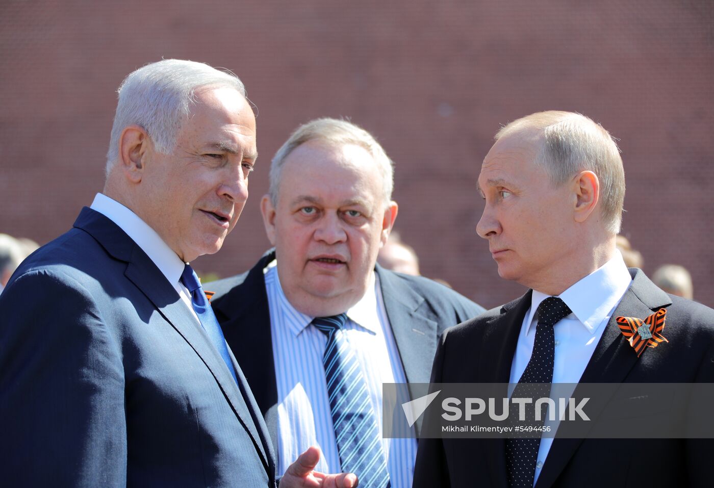President Vladimir Putin and Prime Minister Dmitry Medvedev at wreath-laying ceremony at Unknown Soldiers' Tomb