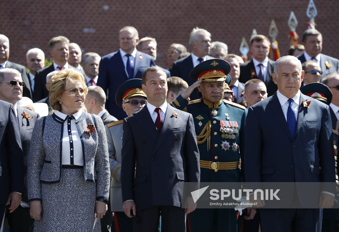 President Vladimir Putin and Prime Minister Dmitry Medvedev at wreath-laying ceremony at Unknown Soldiers' Tomb