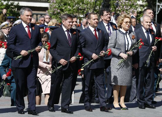 President Vladimir Putin and Prime Minister Dmitry Medvedev at wreath-laying ceremony at Unknown Soldiers' Tomb
