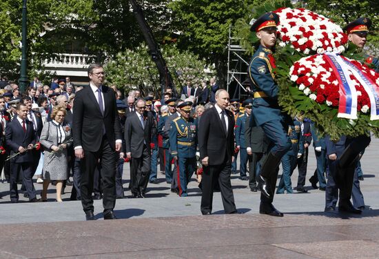 President Vladimir Putin and Prime Minister Dmitry Medvedev at wreath-laying ceremony at Unknown Soldiers' Tomb