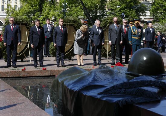 President Vladimir Putin and Prime Minister Dmitry Medvedev at wreath-laying ceremony at Unknown Soldiers' Tomb