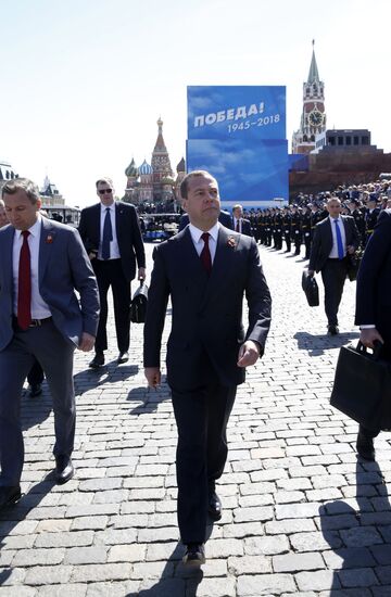 President Vladimir Putin and Prime Minister Dmitry Medvedev at military parade to mark 73rd anniversary of Victory in Great Patriotic War
