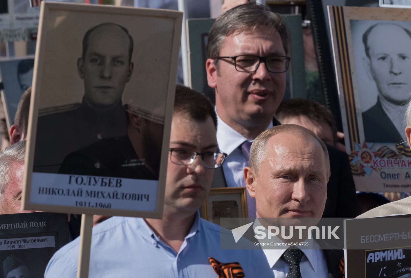 Russian President Vladimir Putin takes part in Immortal Regiment event