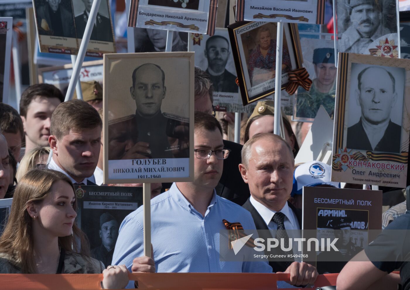 Russian President Vladimir Putin takes part in Immortal Regiment event