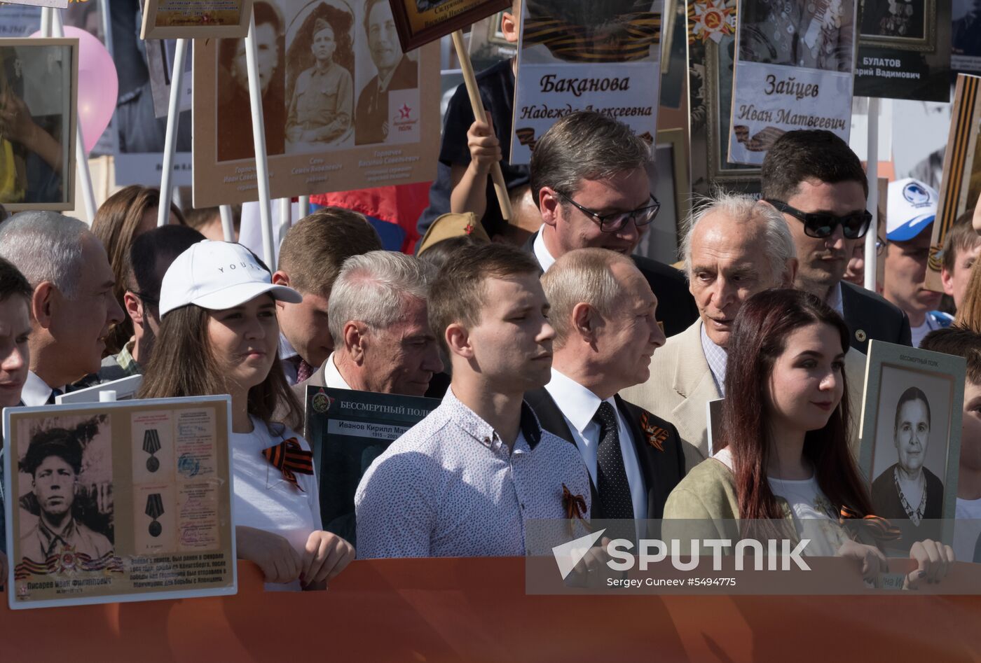 Russian President Vladimir Putin takes part in Immortal Regiment event