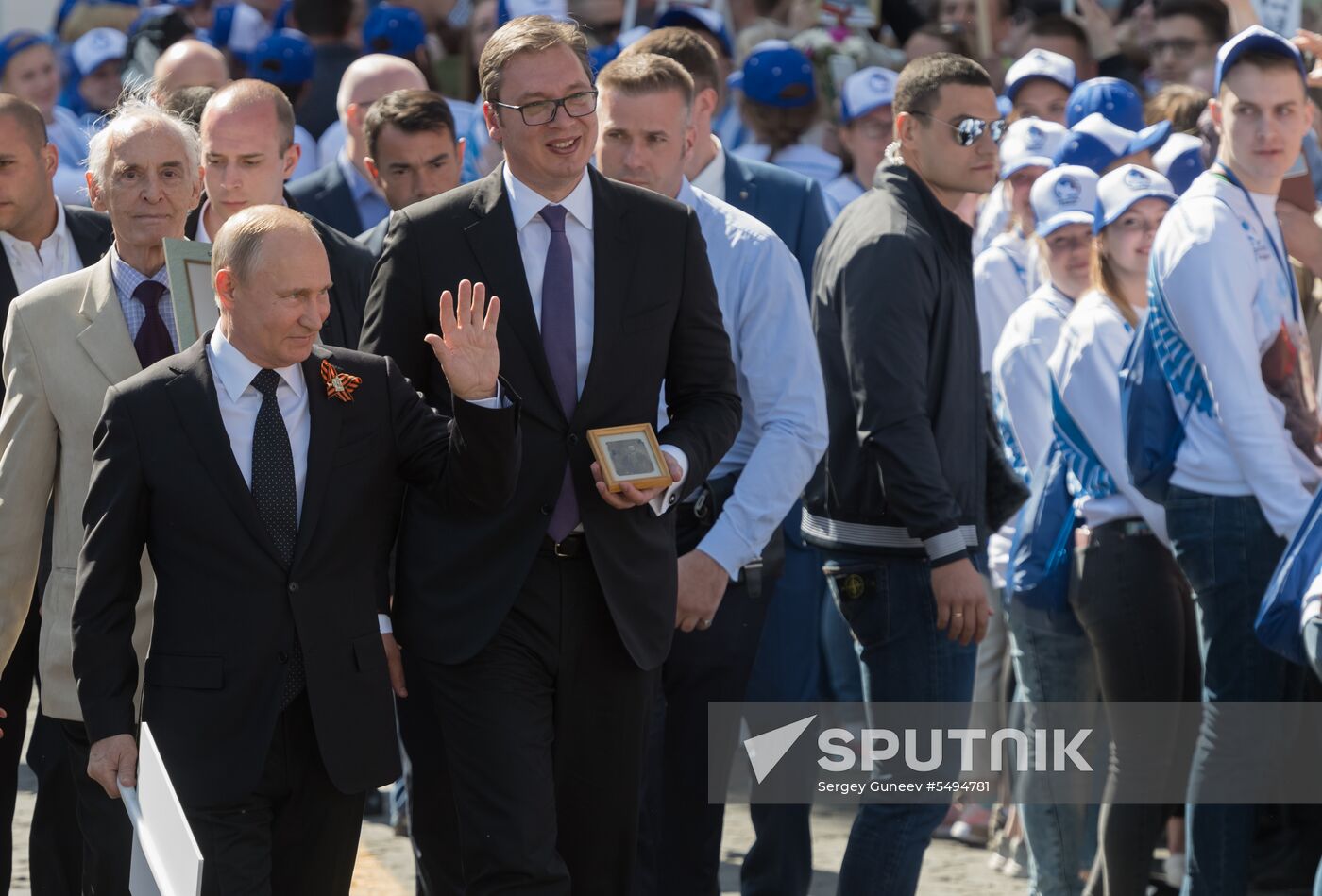 Russian President Vladimir Putin takes part in Immortal Regiment event