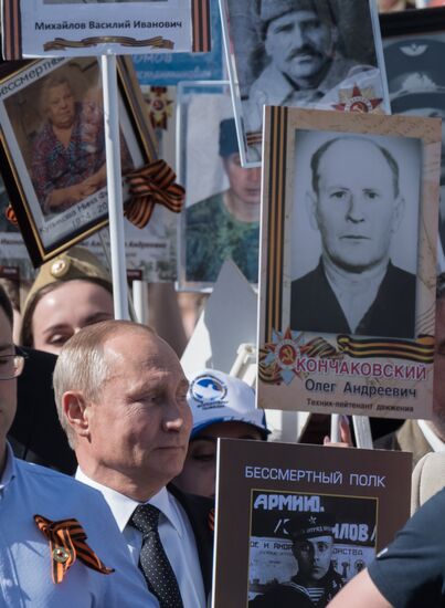Russian President Vladimir Putin takes part in Immortal Regiment event