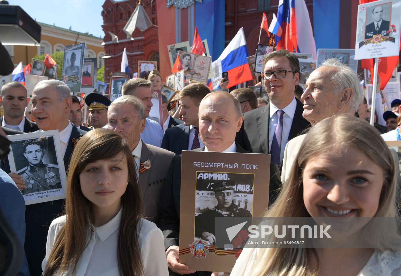 Russian President Vladimir Putin takes part in Immortal Regiment event