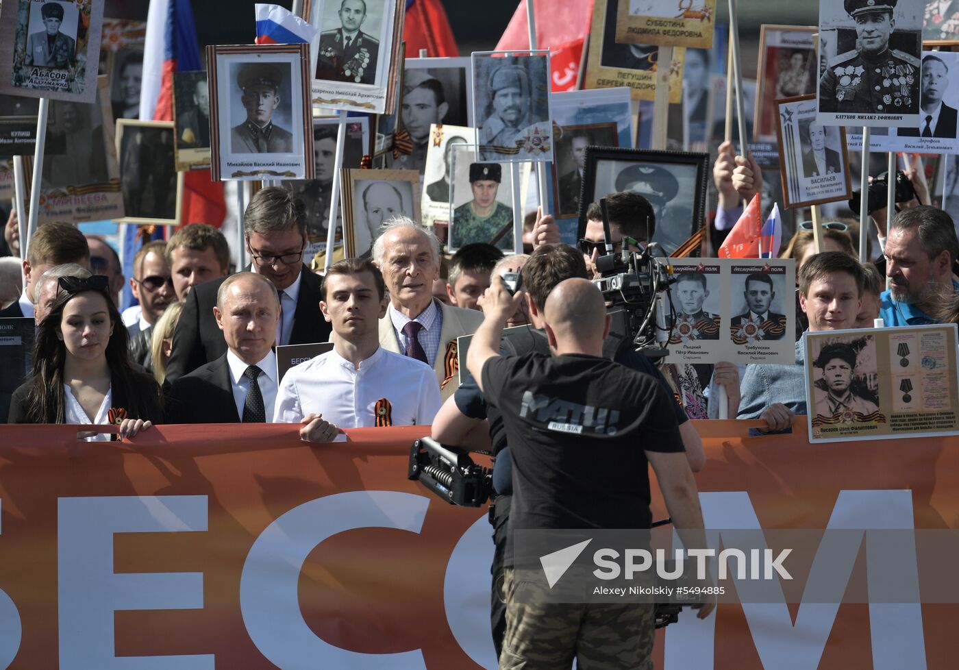 Russian President Vladimir Putin takes part in Immortal Regiment event