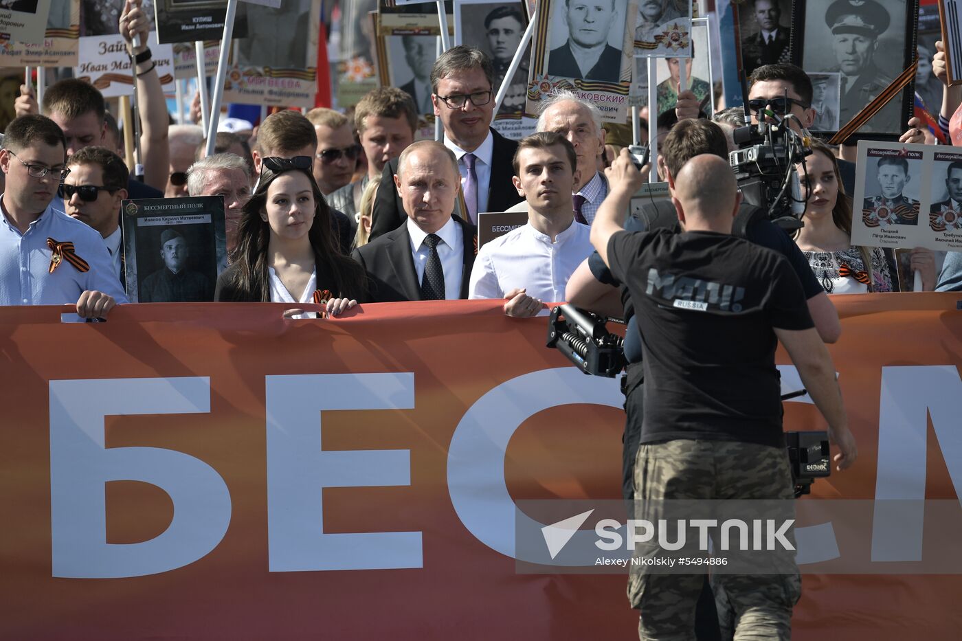 Russian President Vladimir Putin takes part in Immortal Regiment event