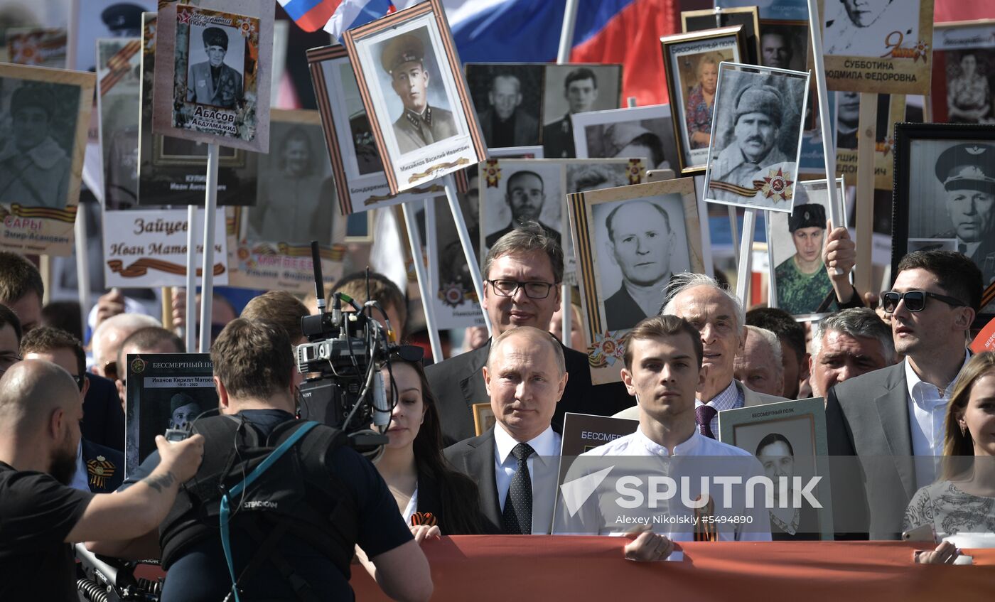 Russian President Vladimir Putin takes part in Immortal Regiment event