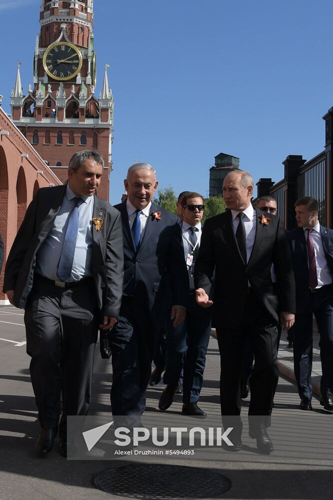 Russian President Vladimir Putin takes part in Immortal Regiment event