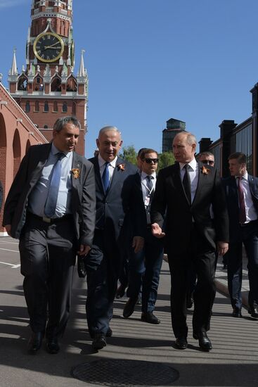 Russian President Vladimir Putin takes part in Immortal Regiment event