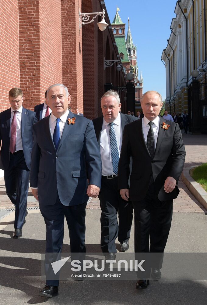 Russian President Vladimir Putin takes part in Immortal Regiment event