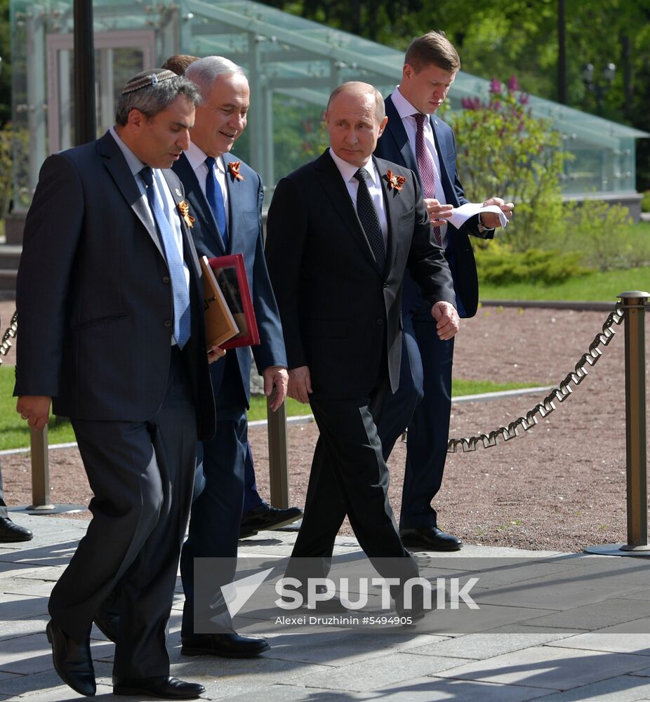 Russian President Vladimir Putin takes part in Immortal Regiment event