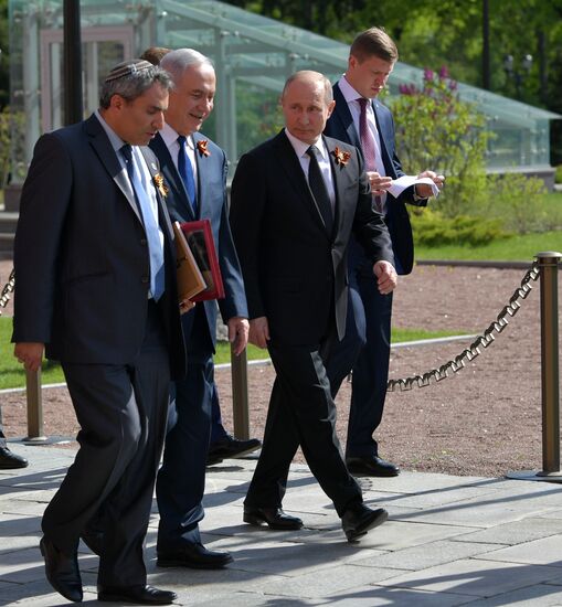 Russian President Vladimir Putin takes part in Immortal Regiment event