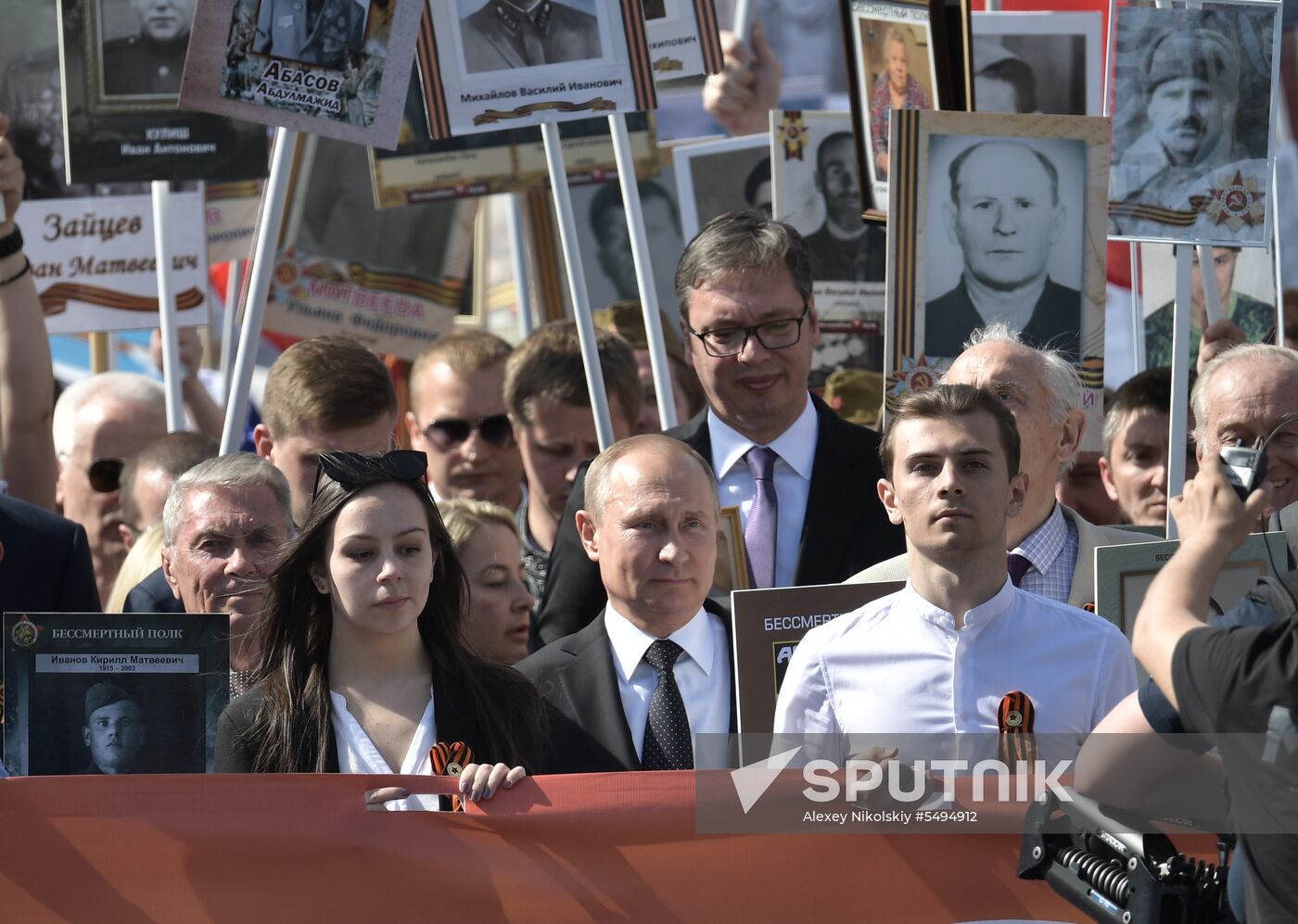 Russian President Vladimir Putin takes part in Immortal Regiment event