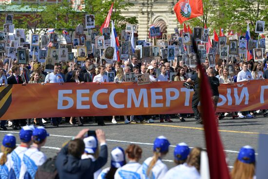 Russian President Vladimir Putin takes part in Immortal Regiment event