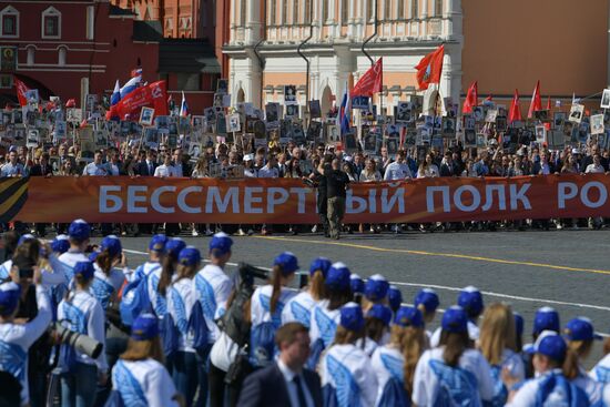 Russian President Vladimir Putin takes part in Immortal Regiment event