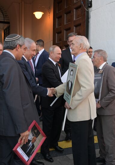 Russian President Vladimir Putin takes part in Immortal Regiment event