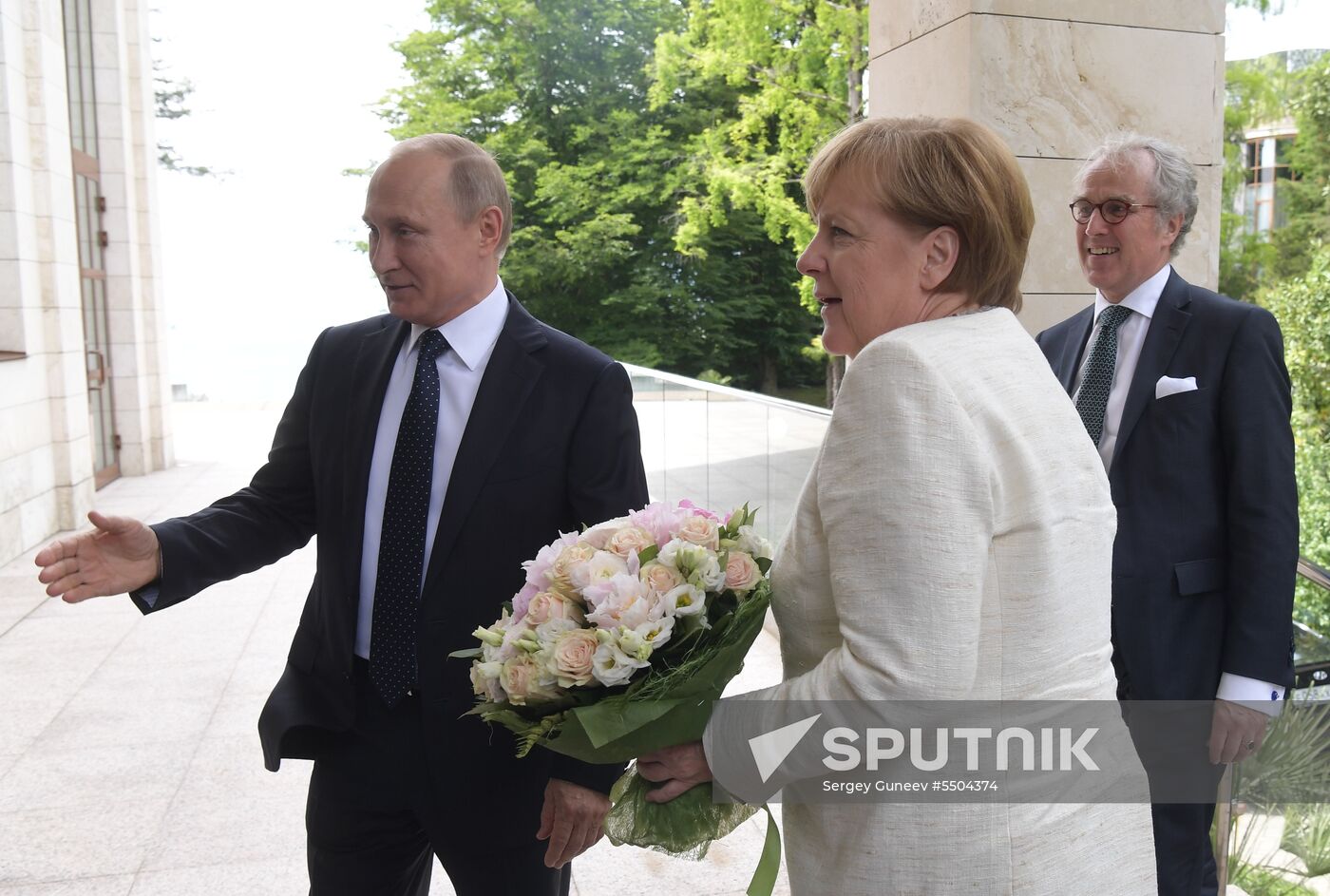President Vladimir Putin meets with German Chancellor Angela Merkel