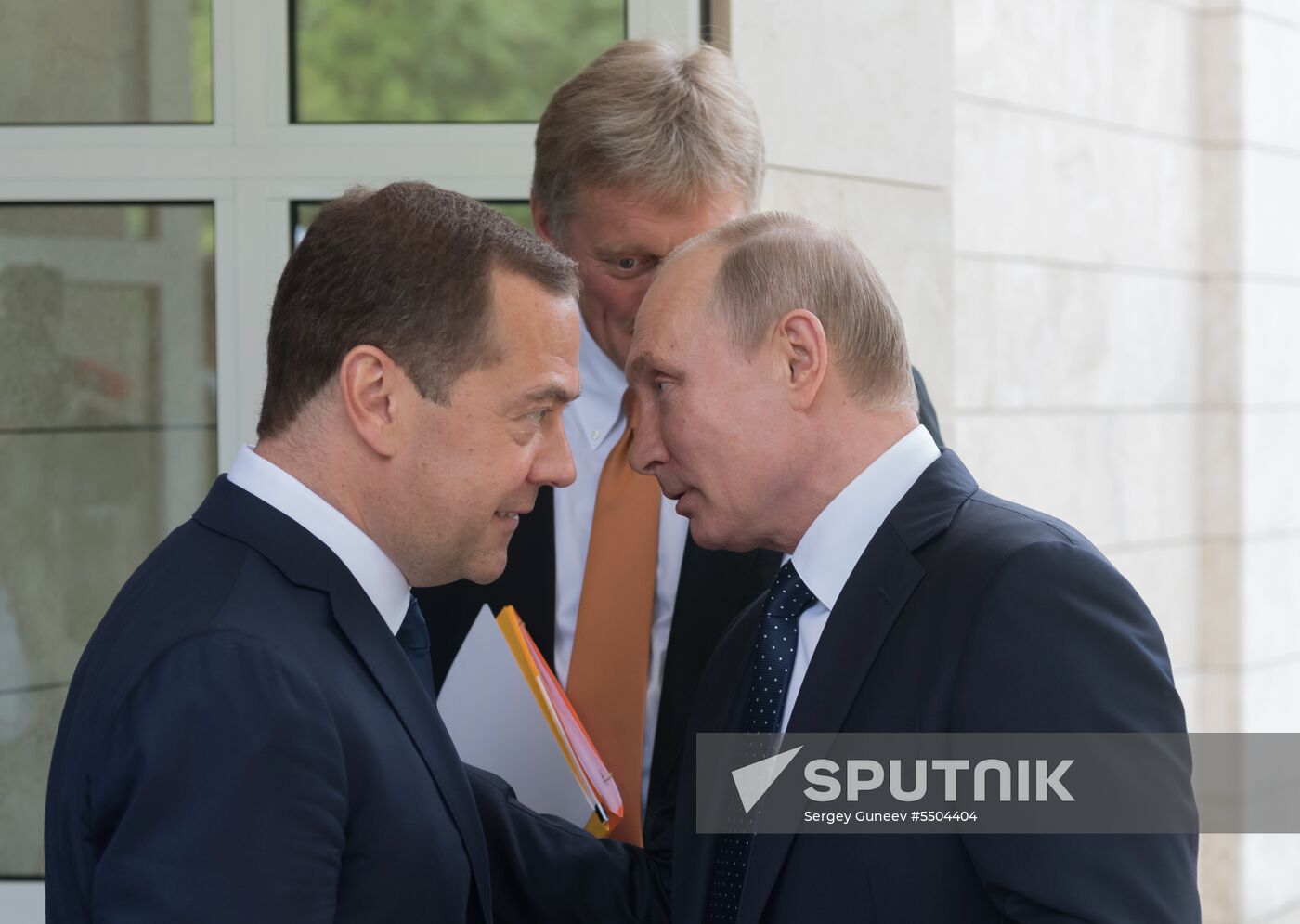 President Vladimir Putin meets with German Chancellor Angela Merkel